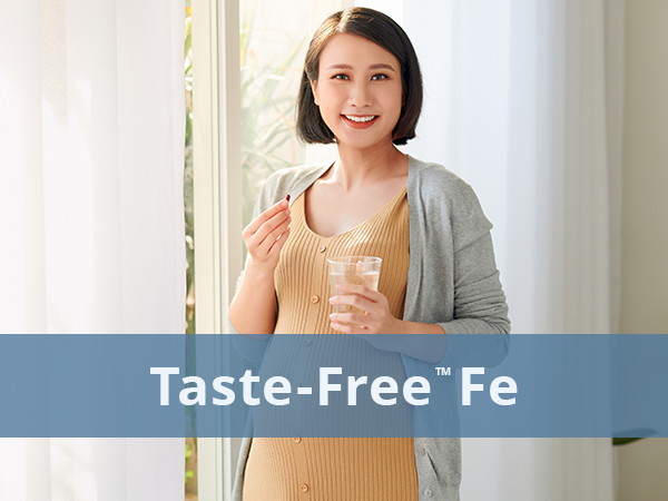 Ferrochel® Taste-Free Iron (Fe) woman taking an Iron supplement with Taste-Free Fe overlay written text.