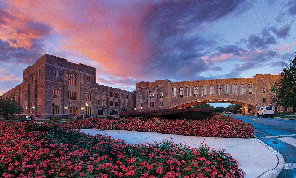 Image of Torgersen Hall with clouds behind