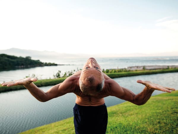 Older man stretching