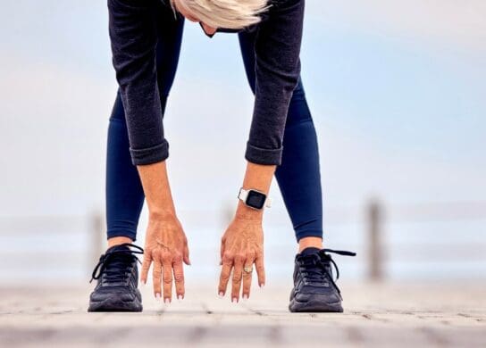 Elderly woman stretching