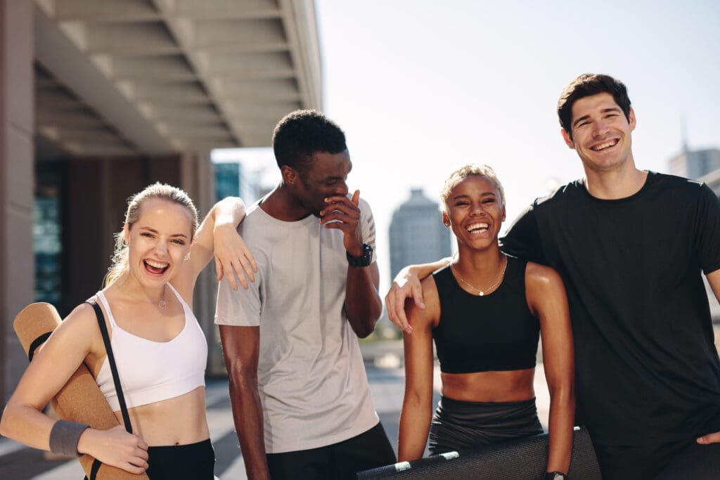 Multiracial Fitness Friends Standing Outdoors